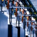 a bunch of wires that are connected to a wall